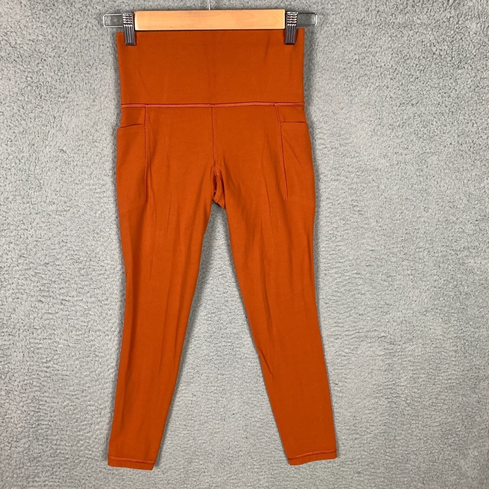 Athleta Salutation 7/8 Tights Women's XS Stash Pocket II High Rise Burnt Orange